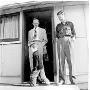 Steve Cole, John Porterfield, and John Cole (foreground) at front door of WMTE.